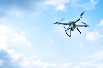 Close up Drone flying a cloudy sky