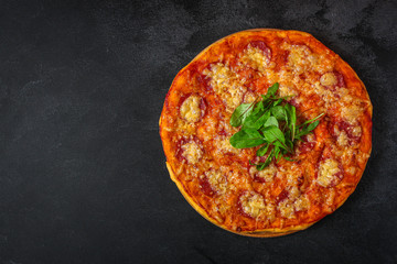 pizza sausages (tomato sauce, cheese, meat). food background. top view. copy space