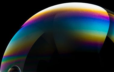 Colors and shapes created in a soap bubble.