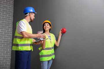 Fire safety specialists inspecting building