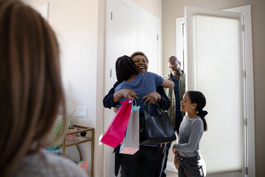 Happy Family Greeting Grandparents