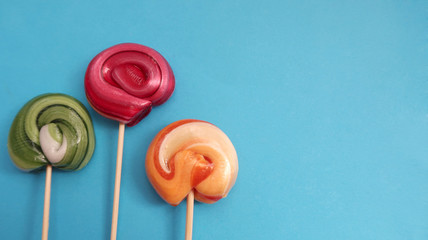  sweets, candies, isolated candies on a blue background, blue isolated background