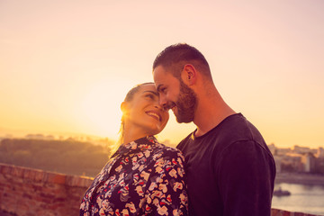 romantic at sunset.romantic couple enjoys together.