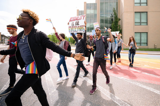 Group of students with banners on gay pride march