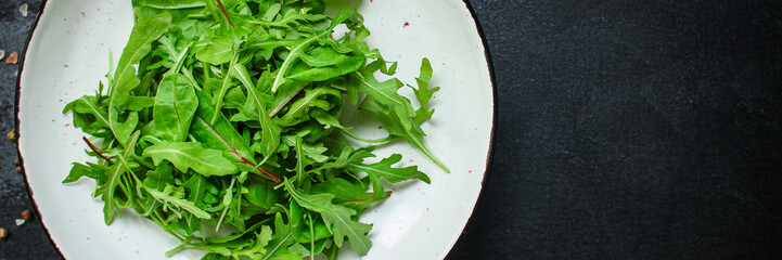 Fototapeta premium Healthy salad, leaves mix salad (mix micro green, juicy snack). food background, Top imsge 