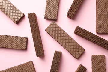Flat lay with wafers on pink background, top view