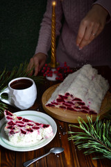 Home made cherry cake Izba on a wooden table.