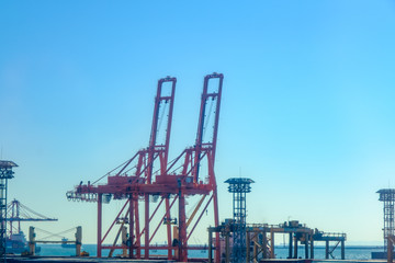 Fototapeta na wymiar large crane for lifting container harbor