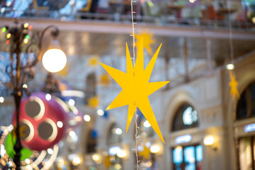 Yellow star Christmas decoration on the street and in the shopping center