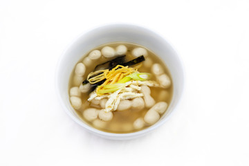 Korean style rice cake soup which is called Jolaeng-i Ddukkuk eats on the Lunar moon new year