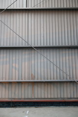 gray walls of industrial metal hangar