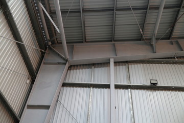 Fototapeta premium gray walls of industrial metal hangar