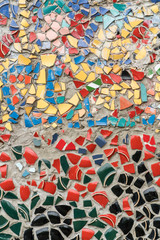 wall covered with broken ceramic pieces