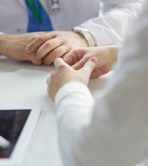 close up of patient and doctor prescribing medication