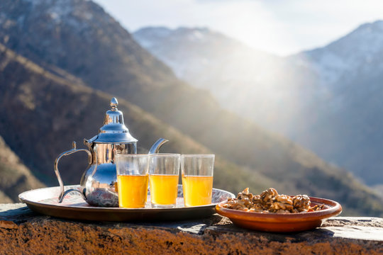 Famous Moroccan mint tea and silver kettle in High Atlas mountains,