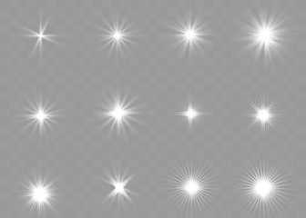 White glowing light explodes on a transparent background. Sparkling magical dust particles. Bright Star. Transparent shining sun, bright flash. Vector sparkles. To center a bright flash.