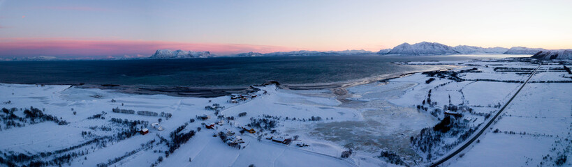 Ice and snow sunset: Scandinavia beautiful landscape of norways lofoten islands in winter aerial / drone