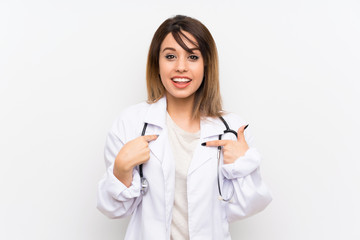 Young doctor woman over isolated background with surprise facial expression
