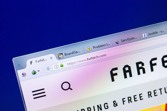 Ryazan, Russia - May 27, 2018: Homepage of FarFetch website on the display of PC, url - FarFetch.com.