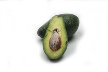 cut avocado isolated on white background. Horizontal image