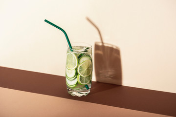 Cucumber and lime tonic water. Cold summer cocktail. Detox drink