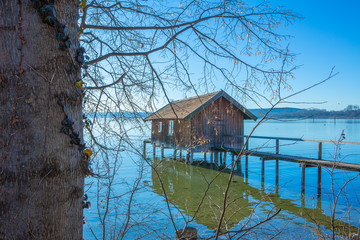 Dock house by the shore of the lake.