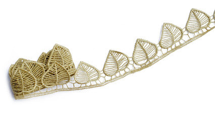 Gold leaves made out of embroidery stitches floral pattern embroidery. This gold fabric lace is great for handmade crafts and DIY supply or craft supplies.