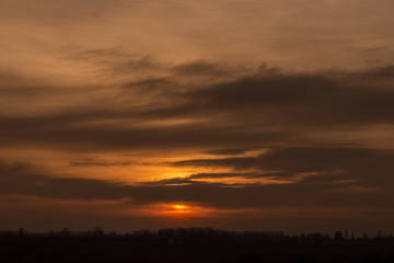 Winter sunset at a cloudy day