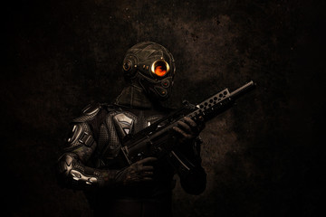 Portrait of a special forces soldier holding an assault rifle in his hands