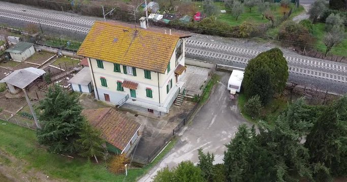 Cantoniera residential house rooftop aerial orbit right above rooftop. Frescobaldi vineyard Chianti wine area. Arno river valley near Florence. Pontassieve, Tuscany. Italy
