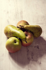 Big ripe pears on soft wooden background