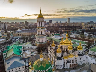 Poster Aerial drone view. Kiev Pechersk Lavra in the sunset. © Sergey