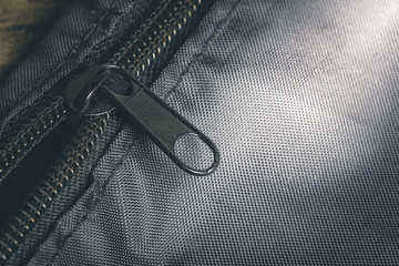 Closeup zipper on a black bag