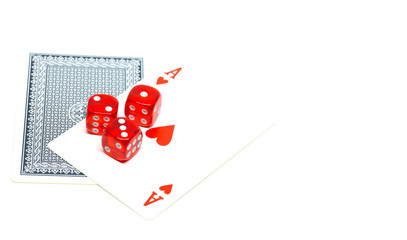 Red dice on ace of hearts on white background
