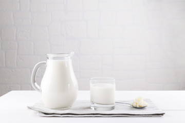 Homemade fermented beverage kefir with kefir grains in bowl on a white background, concept of natural fermented food and intestinal health