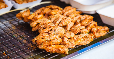 Tod Mun Pla Krai, Thai Deep Fried curried clown knifefish fish cake on local fresh market stall. Traditional Thai Street Food, Fish Cuisine, Culinary, Cooking, Delicacy and Asia Travel Cuisine concept
