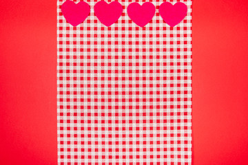 red and white Vichy fabric background for valentines day with hearts. valentines day concept