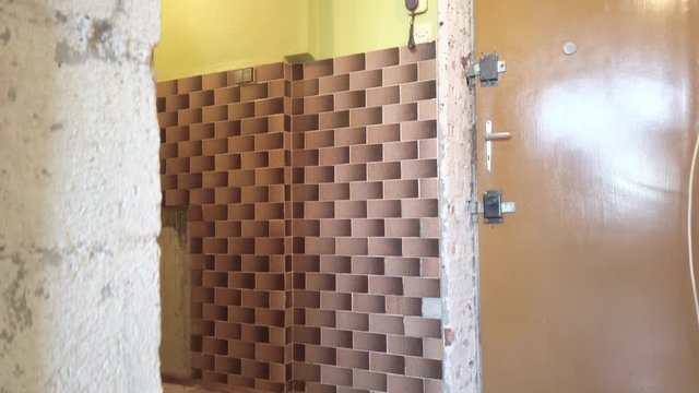 Pedestal shot of a middle class renovation apartment corridors, medium shot