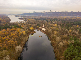 Naklejka na ściany i meble Aerial drone view. View of the Dnieper River in Kiev in the fall.