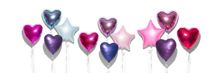 Air Balloons. Bunch of purple heart shaped foil balloons, isolated on white background. Love. Holiday celebration. Valentine's purple, red, pink, blue. Day party decoration. Metallic balloon Birthday