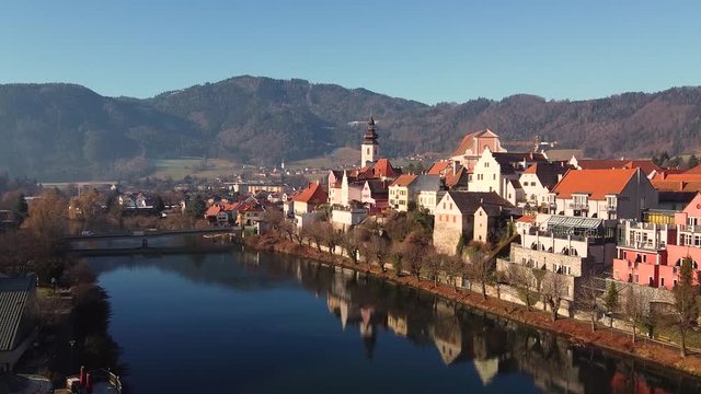 Aerial view of St. Catherines Church, Frohnleiten, Austria, Europe. Flight over Mur river travel destination drone footage