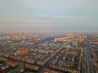 Fototapeta na wymiar Aerial drone view. Residential area of Kiev in the sunset.