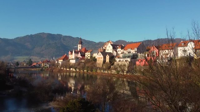 Aerial view of St. Catherines Church, Frohnleiten, Austria, Europe. Flight over Mur river travel destination drone footage