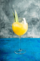 Pineapple cocktail in wine glass. Selective focus. Shallow depth of field.