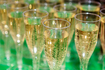 Glasses with champagne on the table