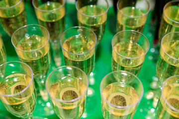Glasses with champagne on the table