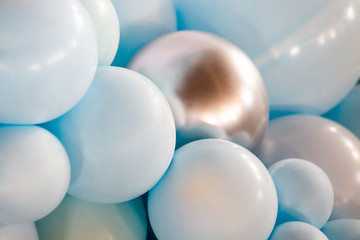 White and blue ball background.
