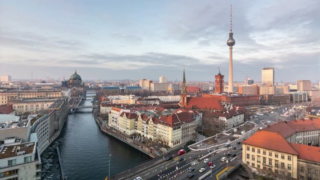 Panoramic view of Berlin with Fernsehturm TV tower, river Spree and Berliner Dom. Couds move fast across the sky. Time lapse video.