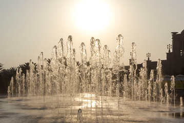 sunset view of the majestic fountains of Emirates Palace