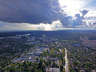 Aeiral drone view. Rain clouds over the city.